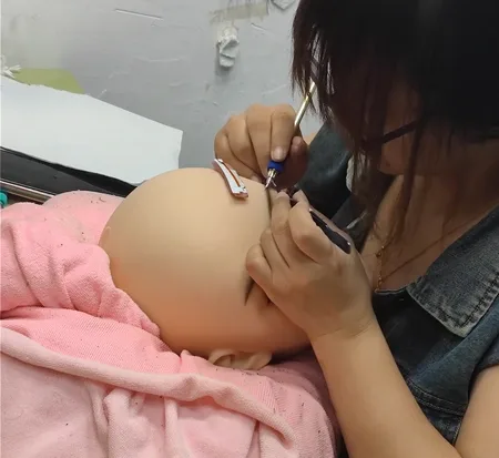 Workshop of All-In-One Life-Size AI Love Sex Doll 10 ulpbestsexdoll.com Planting eyebrows 2 e1727548263105